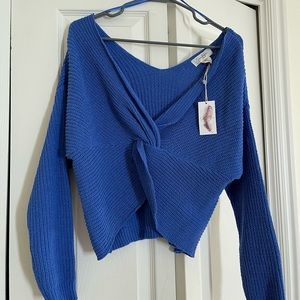 Cross body sweater